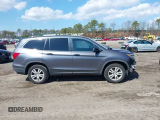 2016 Honda Pilot LX with VIN 5FNYF6H14GB082537, listed as a IAAI auction lot 41864525 with 137,097 mi miles. Bid and sale history available at carsss.com. Image 14.