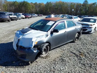 2010 Toyota Corolla with VIN 2T1BU4EE3AC316203, listed as a IAAI auction lot 35972106 with 198,544 mi miles. Bid and sale history available at carsss.com. Image 2.