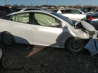2022 Toyota Prius L Eco with VIN JTDKAMFU5N3156063, listed as a IAAI auction lot 41214358 with 208,666 mi miles. Bid and sale history available at carsss.com. Image 14.