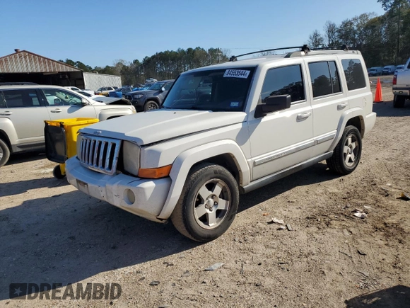 2010 Jeep Commander Sport with VIN 1J4RH4GK9AC113888, listed as a Copart auction lot 84553544 with 208,109 mi miles and Salvage title. Bid and sale history available at DreamBid. Image 1.