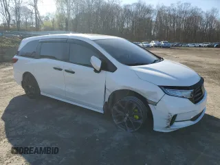 2021 Honda Odyssey EX-L with VIN 5FNRL6H78MB019258, listed as a Copart auction lot 52496285 with 33,734 mi miles and Salvage Title. Bid and sale history available at DreamBid. Image 4.