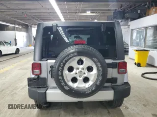 2015 Jeep Wrangler Unlimited Sahara with VIN 1C4BJWEG5FL743663, listed as a Copart auction lot 60205225 with 69,922 mi miles and Salvage title. Bid and sale history available at DreamBid. Image 6.