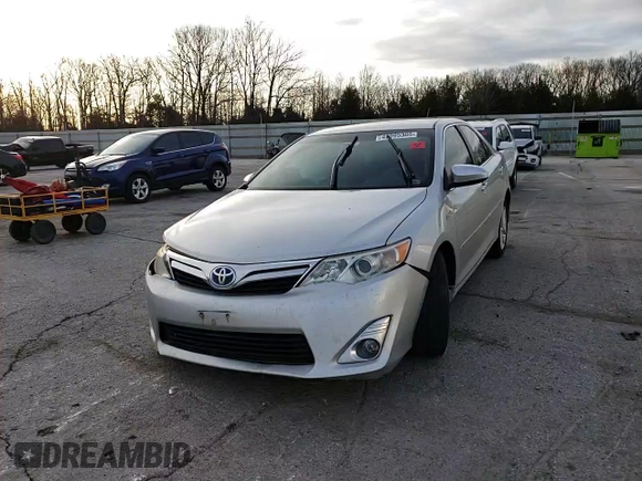 2012 Toyota Camry XLE z VIN 4T1BD1FK5CU046816, wystawiony jako Copart lot #52141865 z przebiegiem 242 479 mil mil oraz Szkoda całkowita • Salvage title. Historia ofert i sprzedaży dostępna na DreamBid. Obrazek 10.