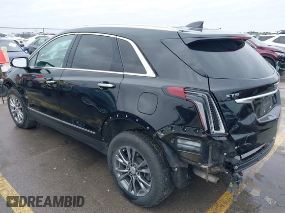 2021 Cadillac XT5 FWD Premium Luxury with VIN 1GYKNCRS3MZ103893, listed as a IAAI auction lot 41286761 with 75,728 mi miles and . Bid and sale history available at carsss.com. Image 3.