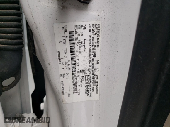 2013 Ford Focus SE z VIN 1FADP3F25DL204052, wystawiony jako Copart lot #57662695 z przebiegiem 124 916 mil mil oraz Szkoda całkowita • Salvage title. Historia ofert i sprzedaży dostępna na DreamBid. Obrazek 12.