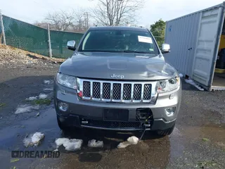 2013 Jeep Grand Cherokee Overland with VIN 1C4RJFCG8DC581719, listed as a IAAI auction lot 41566666 with 152,332 mi miles. Bid and sale history available at carsss.com. Image 12.
