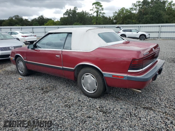 1989 Chrysler LeBaron z VIN 1C3XJ45J8KG223051, wystawiony jako Copart lot #75115464 z przebiegiem 27 923 mil mil oraz Szkody całkowita. Historia ofert i sprzedaży dostępna na DreamBid. Obrazek 2.