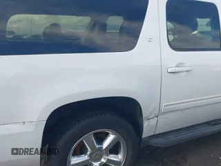 2011 Chevrolet Suburban LT with VIN 1GNSCJE01BR291466, listed as a IAAI auction lot 41800799 with 232,542 mi miles. Bid and sale history available at carsss.com. Image 6.