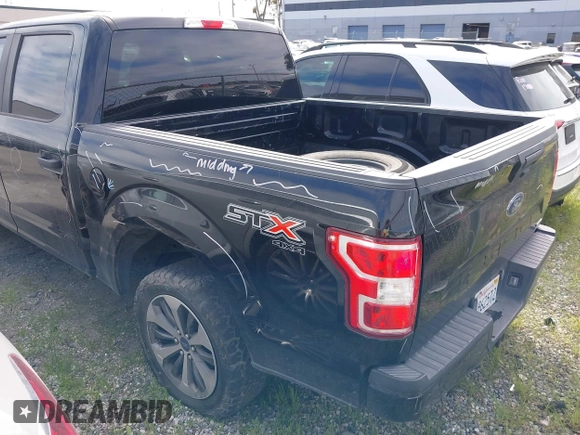 2019 Ford F-150 XL with VIN 1FTEW1EP4KKD73243, listed as a IAAI auction lot 41456076 with 114,198 mi miles. Bid and sale history available at carsss.com. Image 3.