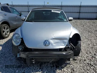 2015 Volkswagen Beetle 1.8T with VIN 3VW517AT8FM810709, listed as a Copart auction lot 48065314 with 61,924 mi miles and Salvage Title. Bid and sale history available at DreamBid. Image 5.