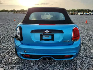2018 MINI Convertible Cooper S с VIN WMWWG9C58J3E39013, выставлен на аукционе Copart как лот 58946435 с пробегом 66 992 миль миль и На запчасти • Non repairable. История ставок и продаж доступна на DreamBid. Изображение 6.