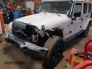 2015 Jeep Wrangler Unlimited Sahara with VIN 1C4BJWEG8FL696581, listed as a IAAI auction lot 41923093 with 193,421 mi miles and . Bid and sale history available at DreamBid. Image 2.