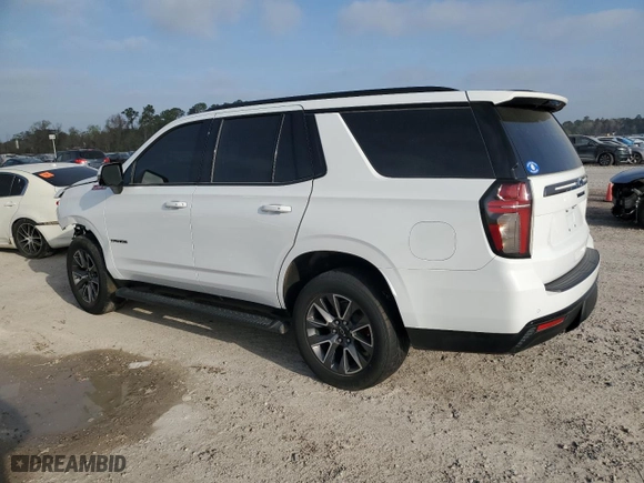 2021 Chevrolet Tahoe Z71 with VIN 1GNSKPKD3MR117317, listed as a Copart auction lot 49102285 with 130,976 mi miles and Salvage Title. Bid and sale history available at carsss.com. Image 2.
