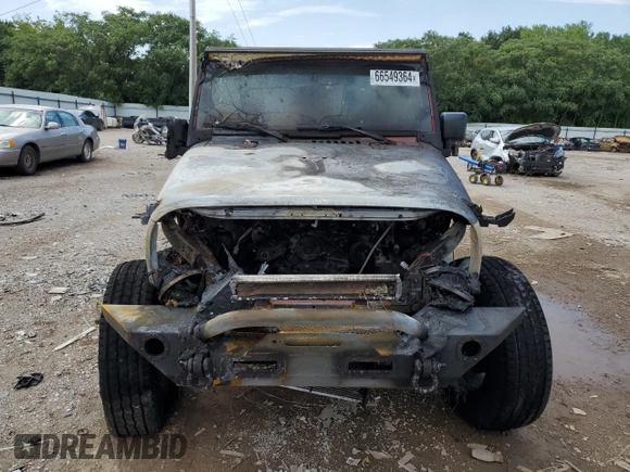 2007 Jeep Wrangler Unlimited Sahara z VIN 1J8GB59107L203053, wystawiony jako Copart lot #66549364 z przebiegiem Nie podano mil oraz Szkoda całkowita • Salvage title. Historia ofert i sprzedaży dostępna na DreamBid. Obrazek 5.