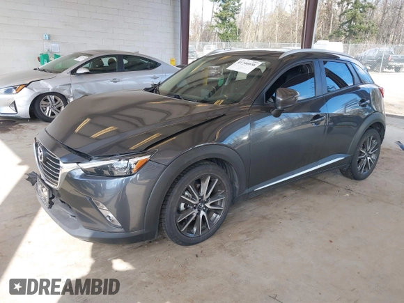 2017 Mazda CX-3 Grand Touring z VIN JM1DKFD70H0150496, wystawiony jako IAAI lot #41746038 z przebiegiem 108 091 mil mil oraz . Historia ofert i sprzedaży dostępna na DreamBid. Obrazek 18.