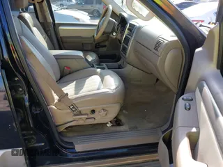 2003 Mercury Mountaineer Convenience z VIN 4M2DU66W13ZJ05239, wystawiony jako IAAI lot #42062881 z przebiegiem 292 631 mil mil oraz . Historia ofert i sprzedaży dostępna na DreamBid. Obrazek 5.