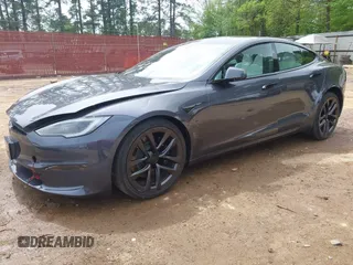 2023 Tesla Model S with VIN 5YJSA1E53PF511231, listed as a IAAI auction lot 41924626 with Not provided miles and . Bid and sale history available at DreamBid. Image 2.