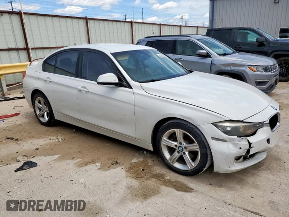 2014 BMW 3 Series 320i z VIN WBA3B1C57EP679989, wystawiony jako Copart lot #56383665 z przebiegiem 125 617 mil mil oraz Szkoda całkowita • Salvage title. Historia ofert i sprzedaży dostępna na DreamBid. Obrazek 4.