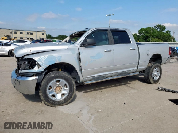 2014 Ram 2500 SLT with VIN 3C6TR5DT2EG205852, listed as a Copart auction lot 59514745 with 130,510 mi miles and Salvage title. Bid and sale history available at DreamBid. Image 1.