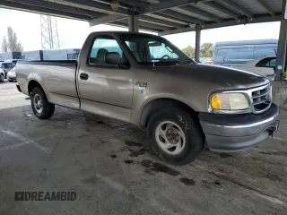 2002 Ford F-150 XL with VIN 1FTRF17W62NB40159, listed as a Copart auction lot 49010765 with 166,719 mi miles and Salvage Title. Bid and sale history available at carsss.com. Image 4.