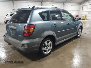 2007 Pontiac Vibe with VIN 5Y2SL65877Z421799, listed as a IAAI auction lot 41675306 with 210,216 mi miles. Bid and sale history available at carsss.com. Image 4.