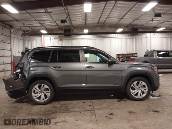 2021 Volkswagen Atlas SE z VIN 1V2KR2CA5MC606590, wystawiony jako IAAI lot #42383813 z przebiegiem 45 087 mil mil oraz . Historia ofert i sprzedaży dostępna na DreamBid. Obrazek 13.