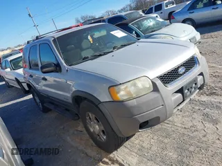 2002 Ford Escape XLT Choice with VIN 1FMYU04112KB96320, listed as a IAAI auction lot 41700476 with 236,832 mi miles. Bid and sale history available at carsss.com. Image 1.