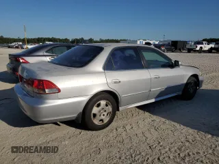 2001 Honda Accord EX z VIN 1HGCG16531A063589, wystawiony jako Copart lot #57875015 z przebiegiem Nie podano mil oraz Szkoda całkowita • Salvage title. Historia ofert i sprzedaży dostępna na DreamBid. Obrazek 3.