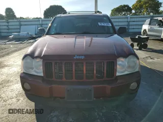 2007 Jeep Grand Cherokee Laredo z VIN 1J8GR48K07C649302, wystawiony jako Copart lot #82167894 z przebiegiem 255 780 mil mil oraz Czysty tytuł • Clean title. Historia ofert i sprzedaży dostępna na DreamBid. Obrazek 5.