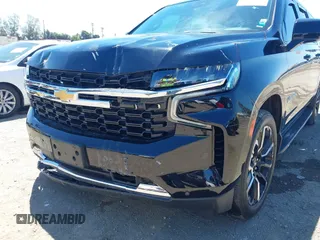 2023 Chevrolet Suburban LS z VIN 1GNSCBKD3PR457569, wystawiony jako IAAI lot #42225571 z przebiegiem 53 410 mil mil oraz . Historia ofert i sprzedaży dostępna na DreamBid. Obrazek 21.