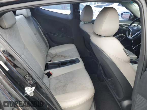 2013 Hyundai Veloster w/Black Int z VIN KMHTC6ADXDU157196, wystawiony jako Copart lot #58091015 z przebiegiem 136 201 mil mil oraz Szkoda całkowita • Salvage title. Historia ofert i sprzedaży dostępna na DreamBid. Obrazek 10.