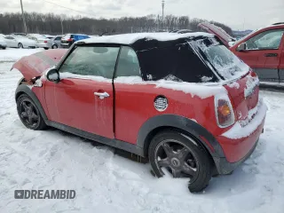 2010 MINI Convertible with VIN WMWMR3C57ATU97979, listed as a Copart auction lot 45903855 with 154,614 mi miles and Salvage Title. Bid and sale history available at DreamBid. Image 2.