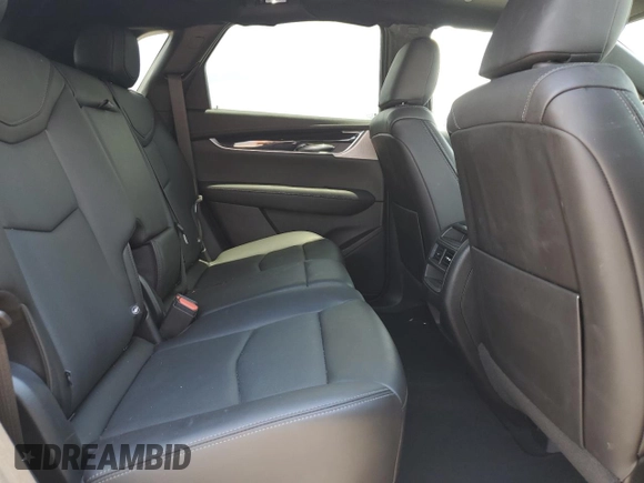 2023 Cadillac XT5 FWD Premium Luxury with VIN 1GYKNCRS3PZ135585, listed as a Copart auction lot 58891914 with 32,325 mi miles and Salvage Title. Bid and sale history available at carsss.com. Image 10.