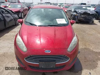 2016 Ford Fiesta SE z VIN 3FADP4BJXGM156814, wystawiony jako IAAI lot #42129721 z przebiegiem 90 353 mil mil oraz . Historia ofert i sprzedaży dostępna na DreamBid. Obrazek 12.