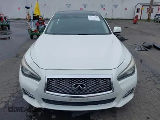 2014 Infiniti Q50 Premium z VIN JN1BV7AP8EM671403, wystawiony jako IAAI lot #41837716 z przebiegiem 115 058 mil mil oraz . Historia ofert i sprzedaży dostępna na DreamBid. Obrazek 13.