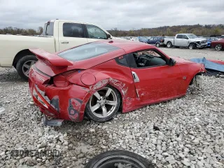 2009 Nissan 370Z z VIN JN1AZ44E19M400603, wystawiony jako Copart lot #79878474 z przebiegiem 129 976 mil mil oraz Szkoda całkowita • Salvage title. Historia ofert i sprzedaży dostępna na DreamBid. Obrazek 3.