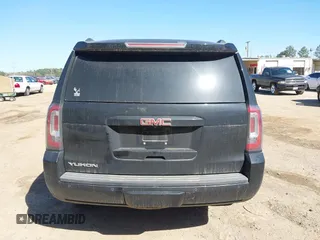 2015 GMC Yukon SLT z VIN 1GKS1BKC8FR112952, wystawiony jako IAAI lot #41836398 z przebiegiem 155 329 mil mil oraz . Historia ofert i sprzedaży dostępna na DreamBid. Obrazek 16.
