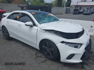 2021 Mercedes-Benz A 220 z VIN W1K3G4EB5MJ310273, wystawiony jako IAAI lot #42116311 z przebiegiem Nie podano mil oraz . Historia ofert i sprzedaży dostępna na DreamBid. Obrazek 1.