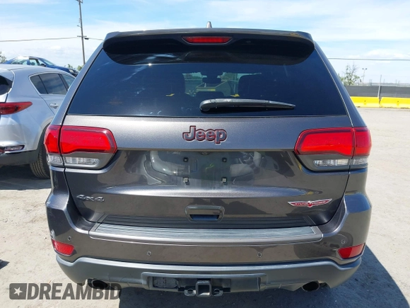 2017 Jeep Grand Cherokee Trailhawk with VIN 1C4RJFLG3HC877110, listed as a IAAI auction lot 42276506 with 144,993 mi miles and . Bid and sale history available at DreamBid. Image 17.