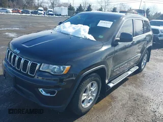 2017 Jeep Grand Cherokee Laredo with VIN 1C4RJEAGXHC685888, listed as a IAAI auction lot 41563643 with 193,997 mi miles. Bid and sale history available at carsss.com. Image 17.
