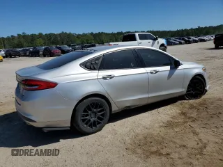 2017 Ford Fusion SE z VIN 3FA6P0HD7HR184691, wystawiony jako Copart lot #52515085 z przebiegiem 113 275 mil mil oraz Szkoda całkowita • Salvage title. Historia ofert i sprzedaży dostępna na DreamBid. Obrazek 3.
