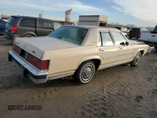 1987 Mercury Grand Marquis GS z VIN 2MEBM74F9HX714211, wystawiony jako Copart lot #43594205 z przebiegiem 26 933 mil mil oraz Szkody całkowita. Historia ofert i sprzedaży dostępna na DreamBid. Obrazek 3.