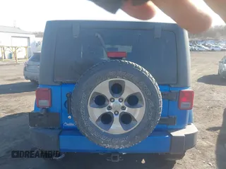 2016 Jeep Wrangler Sahara with VIN 1C4AJWBG7GL102208, listed as a IAAI auction lot 41432362 with 67,243 mi miles and . Bid and sale history available at DreamBid. Image 16.