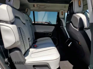 2023 Rivian R1S Launch Edition z VIN 7PDSGABL9PN010792, wystawiony jako Copart lot #56359465 z przebiegiem 24 319 mil mil oraz Szkoda całkowita • Salvage title. Historia ofert i sprzedaży dostępna na DreamBid. Obrazek 11.