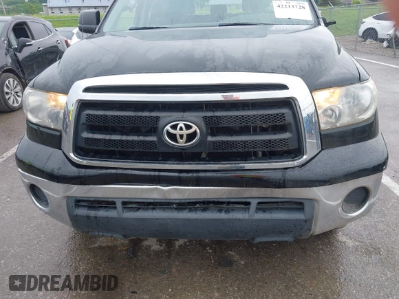 2012 Toyota Tundra z VIN 5TFRM5F15CX040630, wystawiony jako IAAI lot #42213728 z przebiegiem 242 469 mil mil oraz . Historia ofert i sprzedaży dostępna na DreamBid. Obrazek 6.