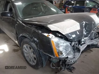 2009 Cadillac DTS w/1SA with VIN 1G6KD57Y49U111830, listed as a IAAI auction lot 41374296 with 78,055 mi miles. Bid and sale history available at carsss.com. Image 1.