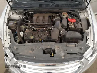 2015 Ford Taurus SEL z VIN 1FAHP2E85FG177576, wystawiony jako Copart lot #54739595 z przebiegiem 89 156 mil mil oraz Szkoda całkowita • Salvage title. Historia ofert i sprzedaży dostępna na DreamBid. Obrazek 11.