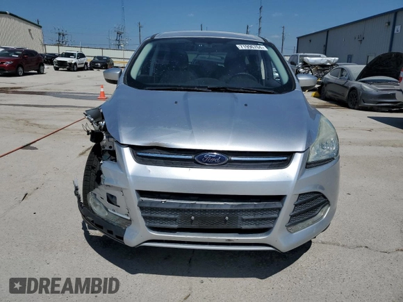 2015 Ford Escape SE with VIN 1FMCU0GX5FUC43739, listed as a Copart auction lot 71996704 with 56,561 mi miles and Salvage Title. Bid and sale history available at carsss.com. Image 5.
