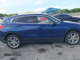 2018 BMW X2 sDrive28i with VIN WBXYJ3C34JEJ82980, listed as a IAAI auction lot 42473599 with 58,109 mi miles and . Bid and sale history available at DreamBid. Image 13.