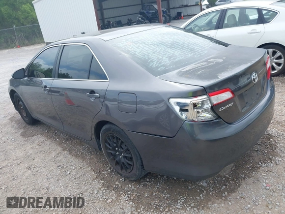 2014 Toyota Camry L with VIN 4T1BF1FK1EU771679, listed as a IAAI auction lot 42090764 with 216,362 mi miles and . Bid and sale history available at DreamBid. Image 3.